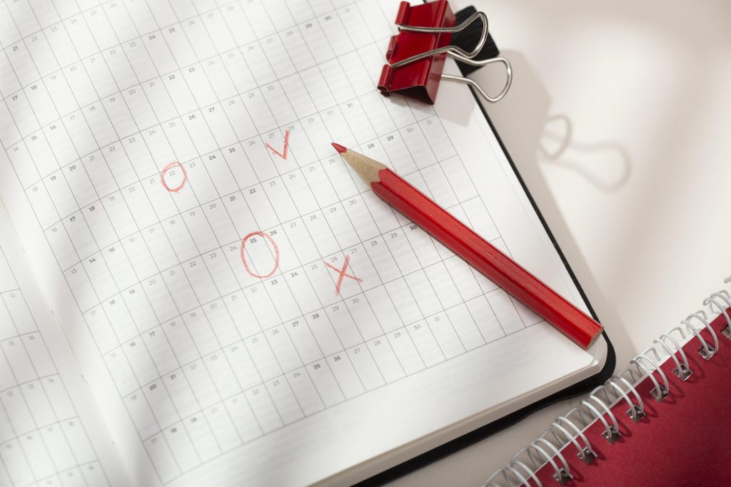 marking timeline for divorce in notebook
